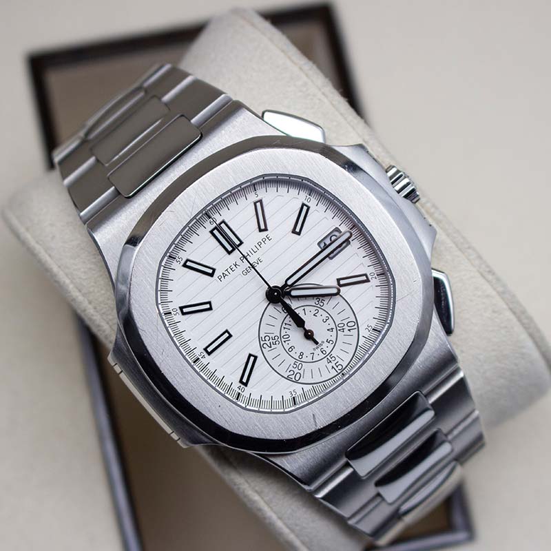 Patek Philippe 5980 1A Nautilus - White Dial 2016 Luxury Swiss Watch Certified Pre-Owned Kensington London Boutique For Discerning Collectors - pro...